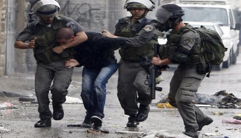 اعتقال شاب فلسطيني-أرشيفية