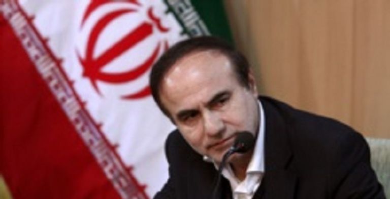 غلام رضا سليماني صورة من اللقاء الذي تم فيه توقيع الاتفاقية