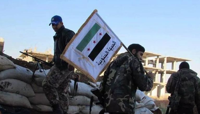 مقاتلون من فصائل المعارضة بجنوب سوريا