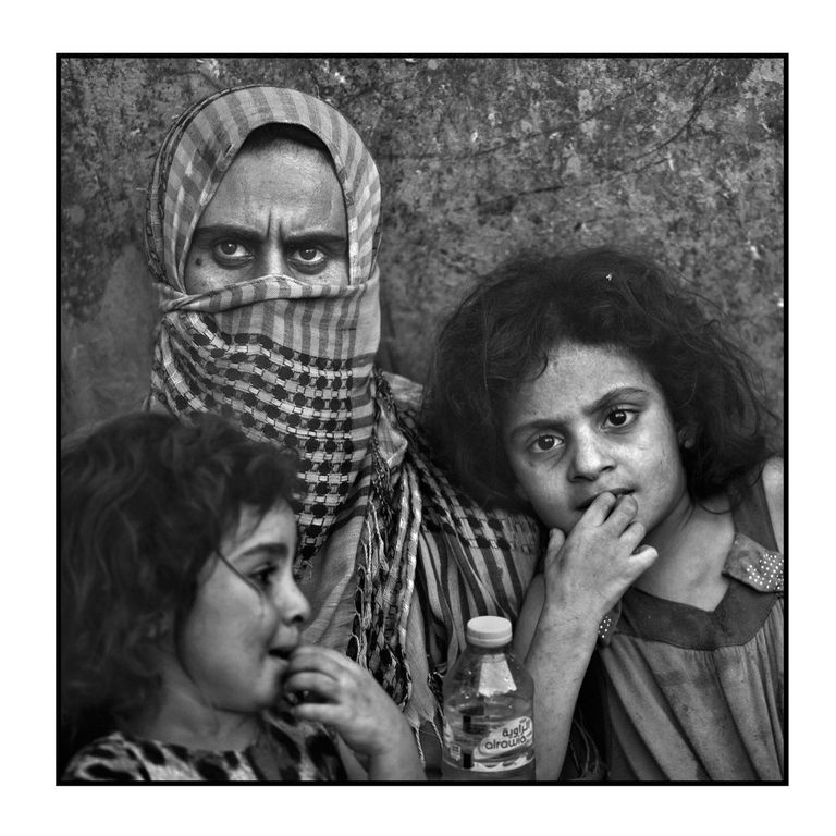 وجوه الأبرياء تجسِّد مأساة الموصل