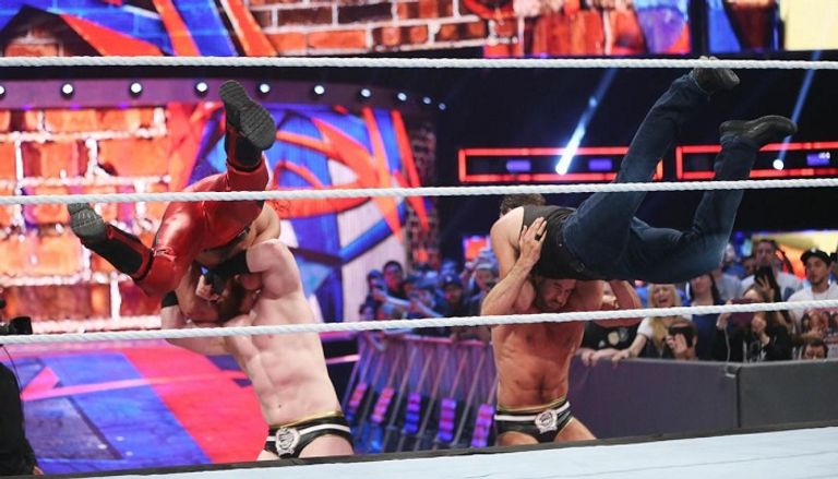 سيث رولينز ودين أمبروز بعد الفوز