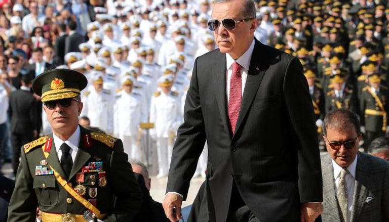 الرئيس التركي أردوغان خلال فعالية يوم النصر (رويترز)