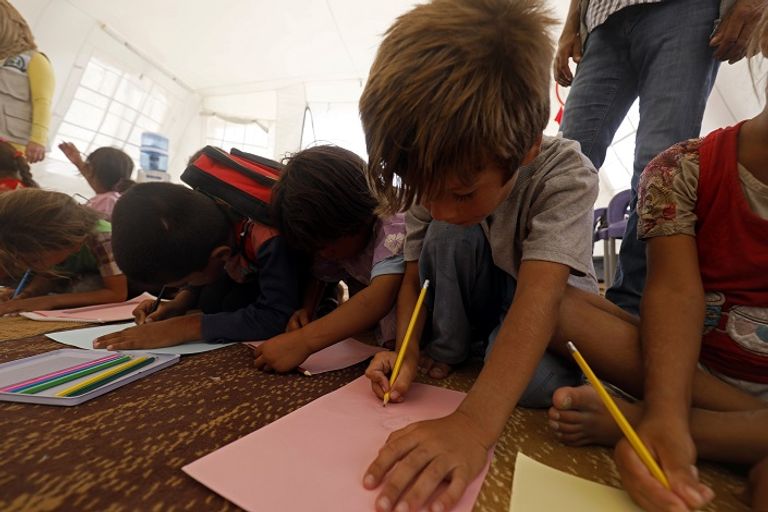 أطفال الرقة في المدارس - أ. ف. ب