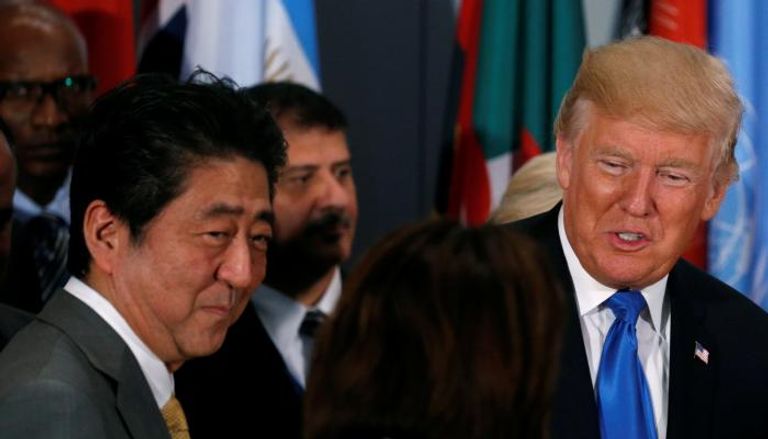 دونالد ترامب ووزير الخارجية الياباني