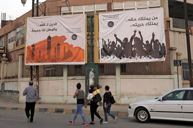 أكراد سوريا خلال الإدلاء بأصواتهم - رويترز