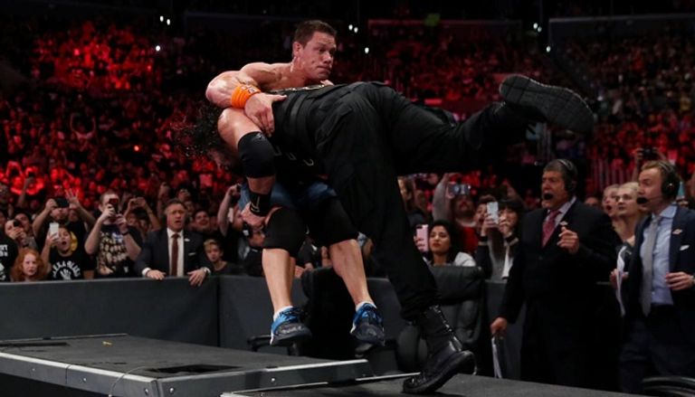 جون سينا ورومان رينز