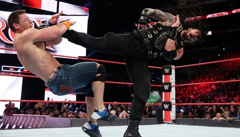 جون سينا ورومان رينز