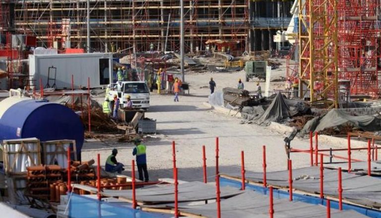 عمال بناء في قطر
