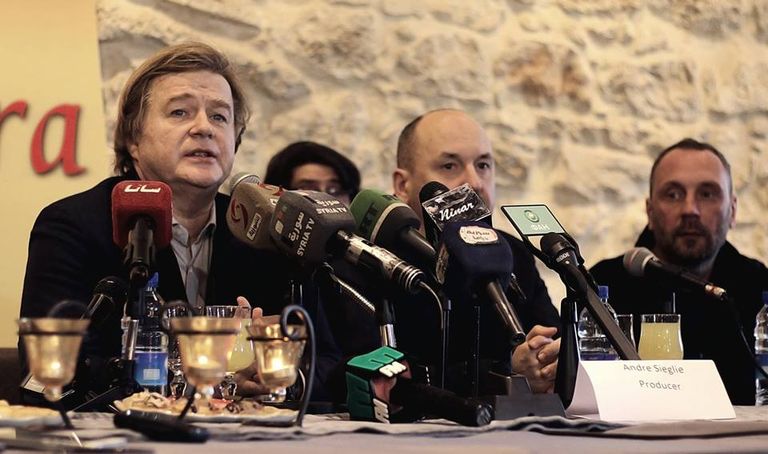 خلال المؤتمر الصحفي لفيلم "تدمر" سلاف فواخرجي ووائل رمضان خلال المؤتمر الصحفي