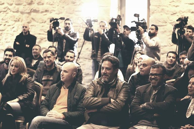 الحضور خلال مؤتمر فيلم "تدمر" سلاف فواخرجي ووائل رمضان خلال المؤتمر الصحفي