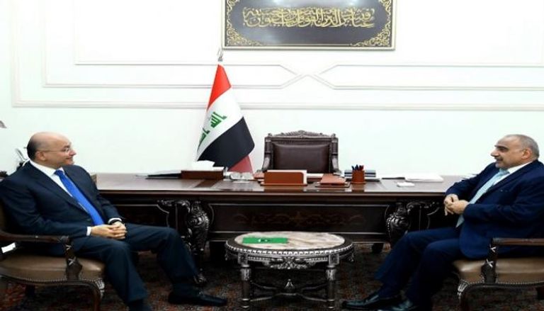 صور للرئيس العراقي ورئيس الوزراء المكلف أوردتها وسائل إعلام عراقية 