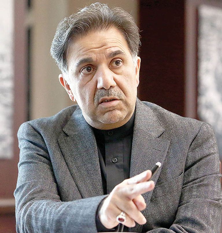 عباس آخوندي وزير النقل الإيراني المستقيل من منصبه الرئيس الإيراني حسن روحاني - أرشيفية