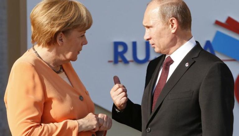 المستشارة الألمانية أنجيلا ميركل والرئيس الروسي فلاديمير بوتين 