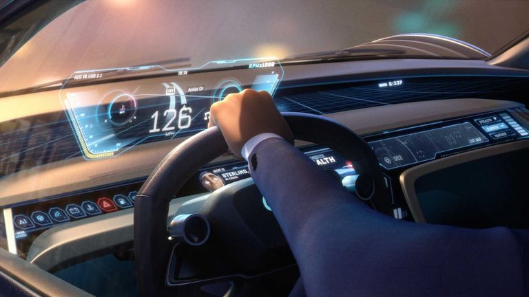 شخصية ويل سميث بالفيلم بجانب موديل e-tron