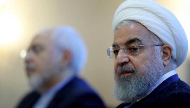 رئيس الحكومة الإيرانية حسن روحاني ووزير خارجيته جواد ظريف