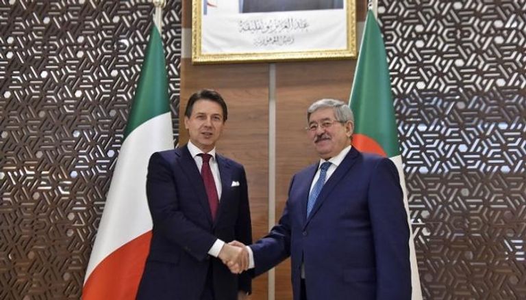 رئيس الوزراء الجزائري مع نظيره الإيطالي - أ. ف. ب