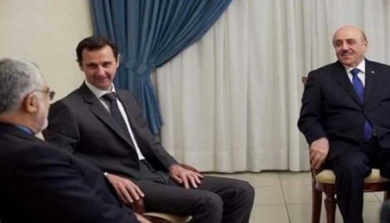 الرئيس السوري بشار الأسد ومستشاره علي مملوك