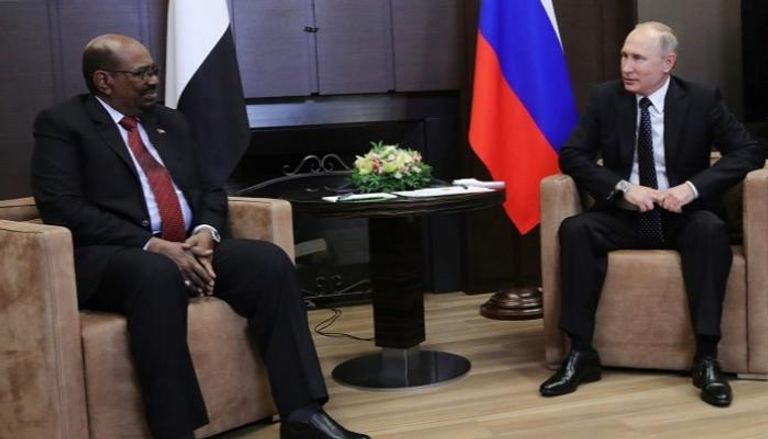 الرئيس الروسي فلاديمير بوتين ونظيره السوداني البشير - أرشيفية