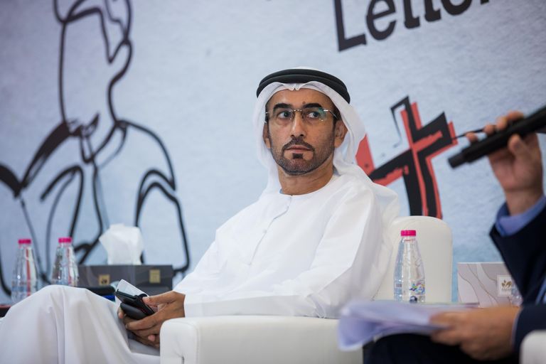 غسان الحسن وسلطان العميمي وشيخة المطيري خلال الندوة