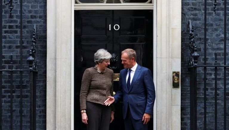 دونالد توسك وتيريزا ماي الوزراء رفضوا خطة الخروج التي أعدتها رئيسة الوزراء تيريزا ماي