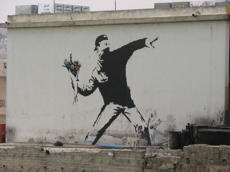 صورة من معرض فنان الشارع الشهير بانكسي في ميلانو - صورة أرشيفية