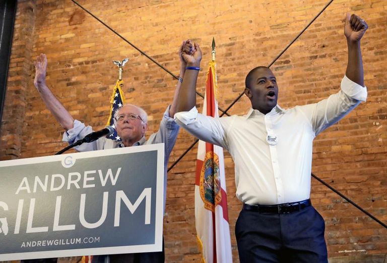 ساندرز مع جيلوم في فلوريدا أندرو جيلوم ديمقراطي من أصول أفريقية والرئيس السابق أوباما