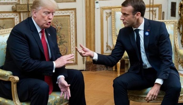 الرئيس الفرنسي ونظيره الأمريكي خلال لقاء في قصر الإليزيه