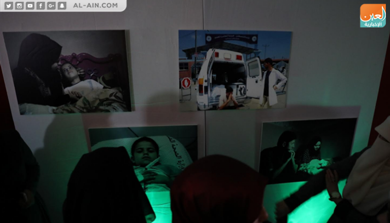 جانب من صور الشبان في معرض "كواليس" بغزة