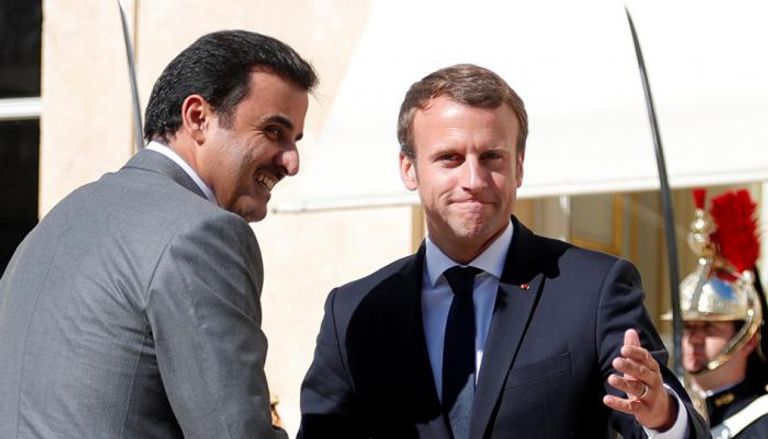 الرئيس الفرنسي إيمانويل ماكرون وأمير قطر تميم بن حمد- أرشيفية