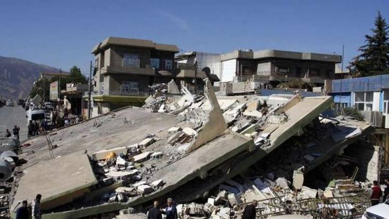 جانب من خسائر زلزال بيرو.  حرائق غابات كاليفورنيا ـ أرشيفية.