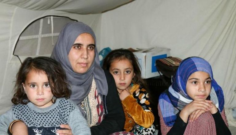 العراقية سناء مع أطفالها
