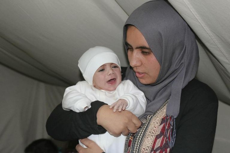 العراقية سناء مع أطفالها