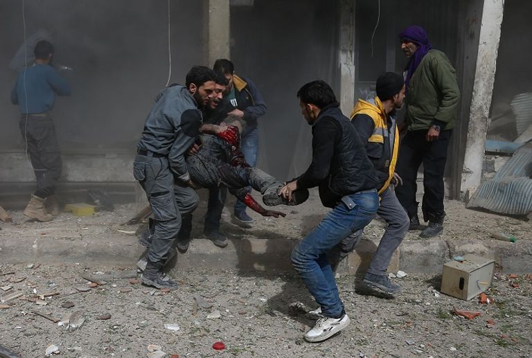 جانب من الدمار الذي خلفته غارات النظام السوري على الغوطة الشرقية جانب من الدمار الذي خلفته غارات النظام السوري على الغوطة (أ ف ب)