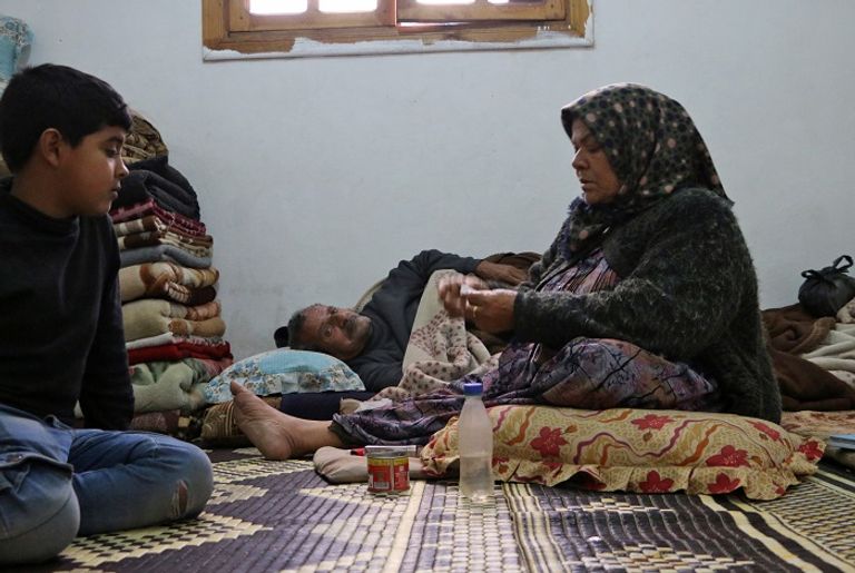 أمونة حسن تحكي مأساة عشرات الأسر النازحة جراء عدوان تركيا على عفرين- أ.ف.ب عفرين تتعرض للعدوان التركي - أ.ف. ب