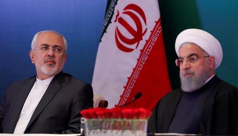 الرئيس الإيراني روحاني ووزير خارجيته جواد ظريف