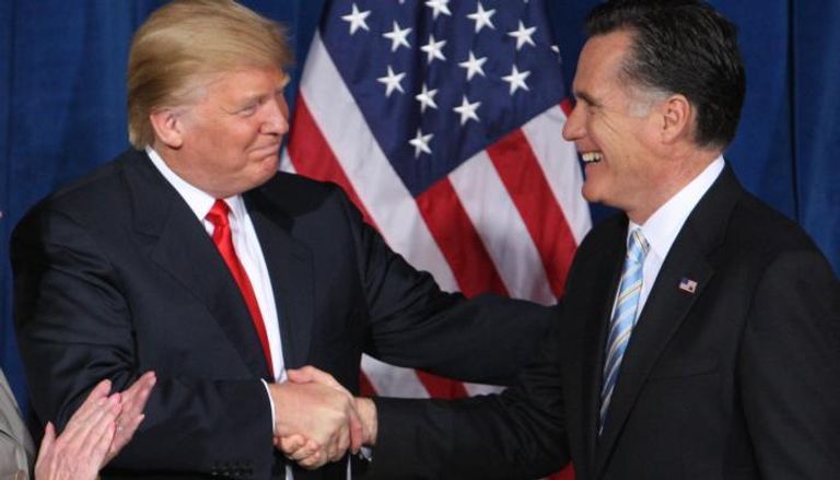 ترامب ورومني - أرشيفية رومني خلال إطلاق حملته الانتخابية - رويترز