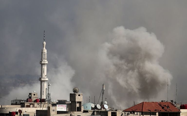 جانب من القصف الذي تتعرض له الغوطة الشرقية (أ ف ب) جانب من القصف الذي تتعرض له الغوطة الشرقية (أ ف ب)