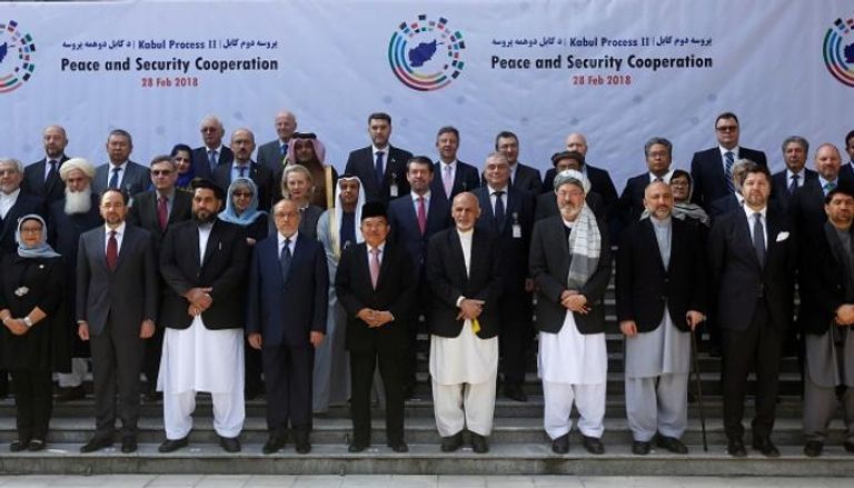 صورة تذكارية للمشاركين بمؤتمر السلام في أفغانستان - رويترز