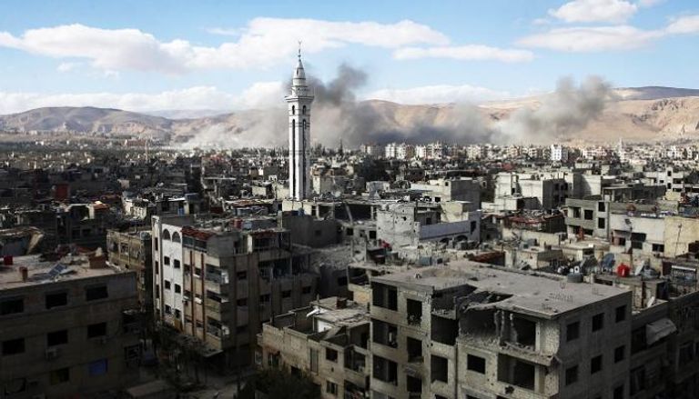 أعمدة الدخان تتصاعد في الغوطة الشرقية - أرشيفية