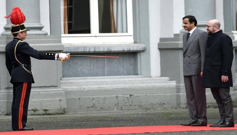 رئيس الوزراء البلجيكي شارل ميشيل وأمير الإرهاب القطري تميم بن حمد