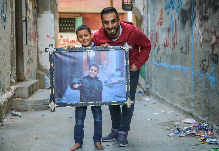 برواز المخيم.. مبادرة ترسم الفرحة على وجوه لاجئي مخيم جباليا