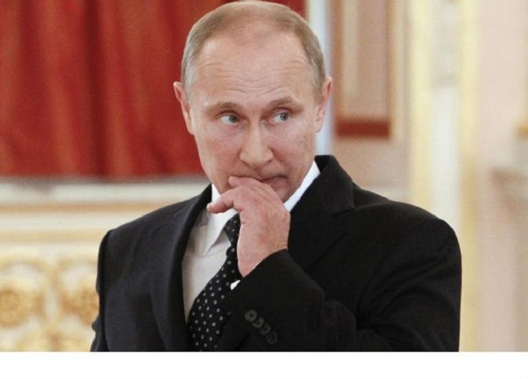 الرئيس الروسي فلاديمير بوتين الجاسوس الروسي السابق ألكسندر ليتفنينكو