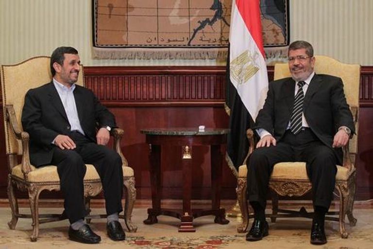 مرسي ونجاد قيادات من الإخوان وإيران في مؤتمر برعاية حزب الله في بيروت