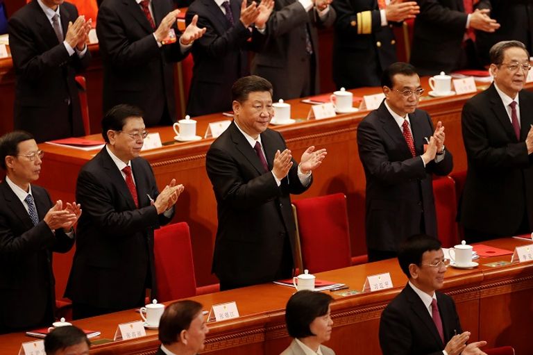 الرئيس الصيني خلال حضوره الجلسة الختامية للبرلمان - رويترز الرئيس الصيني خلال الجلسة الختامية للبرلمان - رويترز