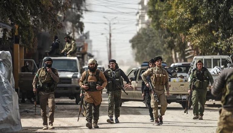 قوات موالية لتركيا لدى دخولها مدينة عفرين السورية- أ.ف.ب