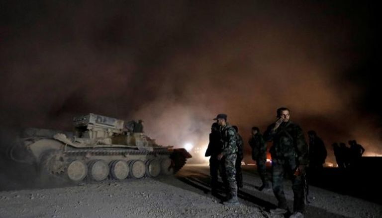 قوات النظام السوري في حرستا - رويترز