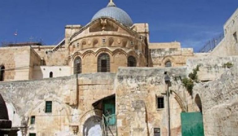 كنيسة القيامة بالقدس المحتلة - أرشيفية باب كنيسة القيامة وهو مغلق-أرشيفية