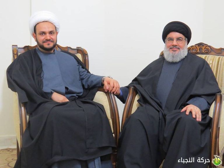 الأمين العام لحركة النجباء والأمين العام لحزب الله الإرهابي أمين عام حركة النجباء خلال زيارة لتجديد الولاء لخامنئي