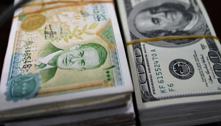 ثبات أسعار الليرة السورية أمام الدولار في السوق الرسمية