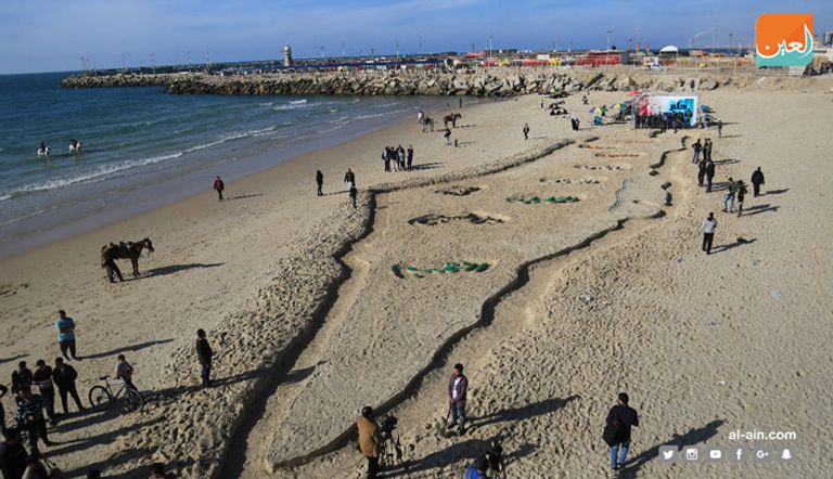 منحوتة حلم الشهيد على رمال غزة